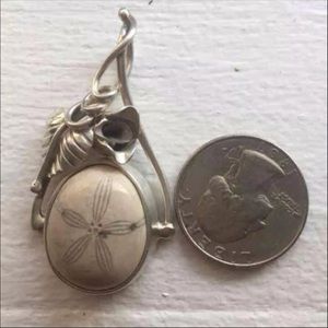Silver fossilized sea urchin pendant